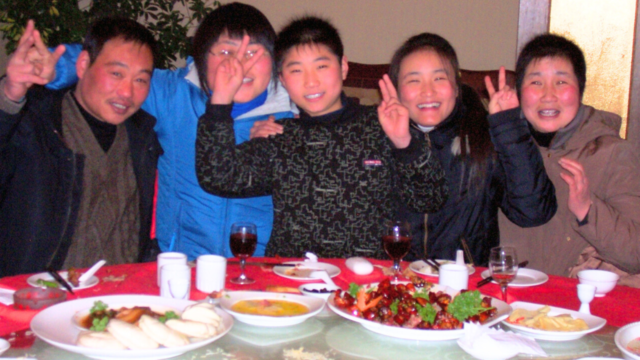 Chinese New Year family reunion dinner, Xiangcheng, Henan, China, 2008.