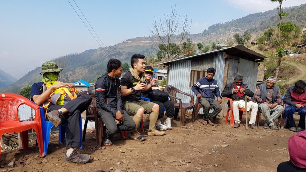 One of our regular project discussions with the villagers, enabled by a local translator. Photo Credit: Mark Yeow, taken for #LoveNepal Team 12.